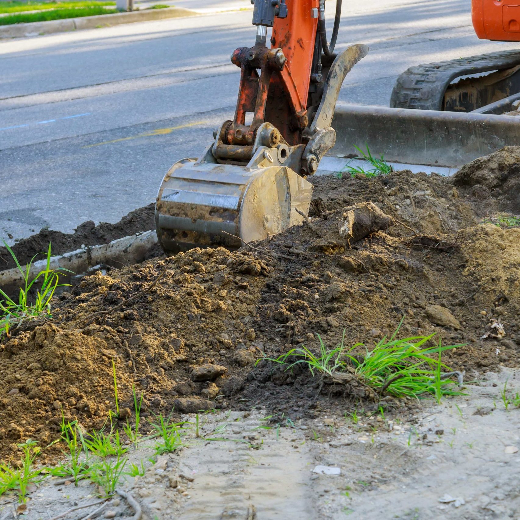 digger-working-at-construction-in-excavation-pit-2021-08-30-18-43-16-utc